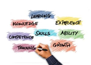 Experience skills ability growth training written in marker.