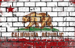 California flag painted on brick wall.