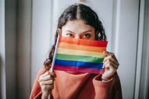 Person with rainbow flag.